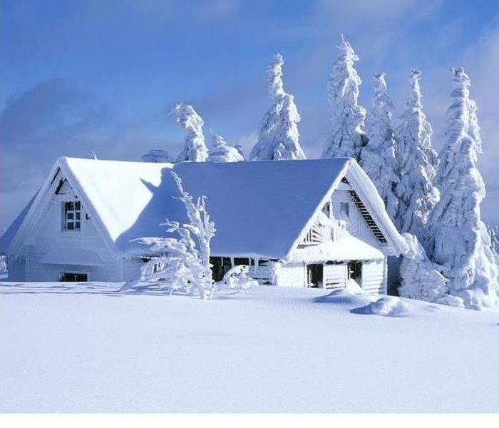 House covered in snow